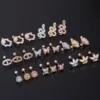 Hce11fbf222784b8999787dd4a07f9e49O.webp Trendy Plated Stud Earrings With Solid Brass and Platinum Featuring Snake and Flower Designs With Zircon and Stone